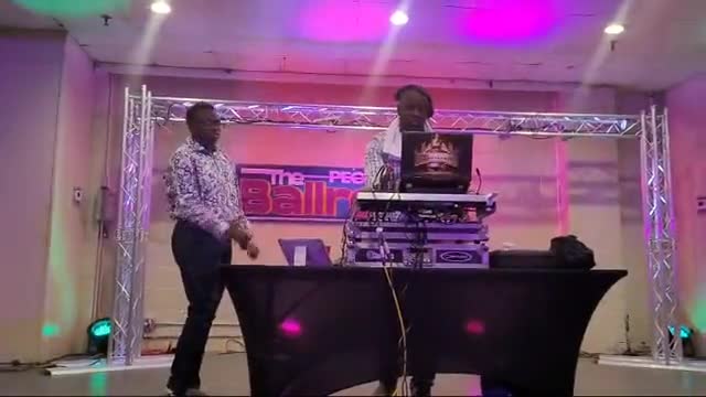 DJ and MC performance at an indoor event. Silent preview.